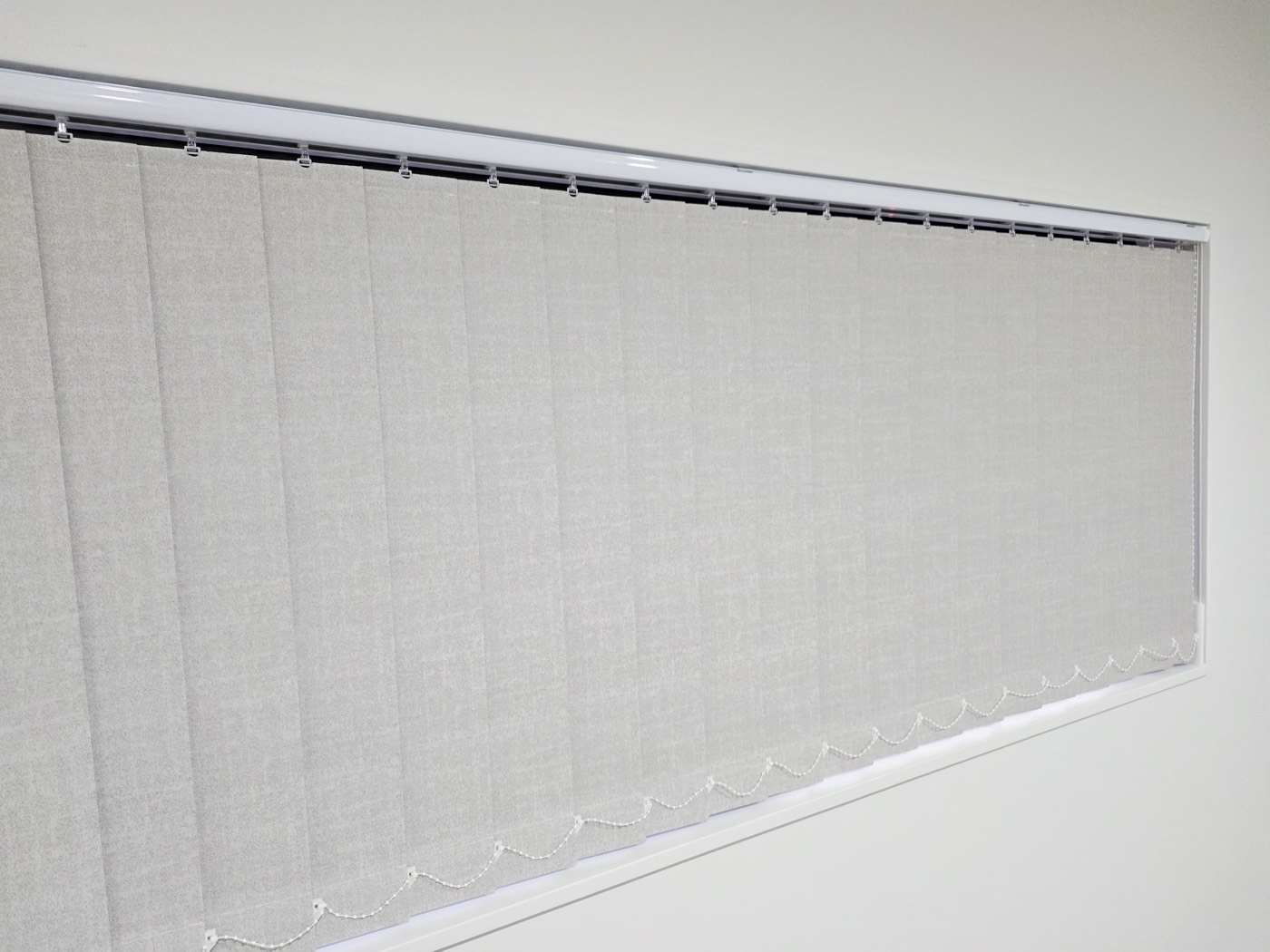 Vertical blinds in a living space