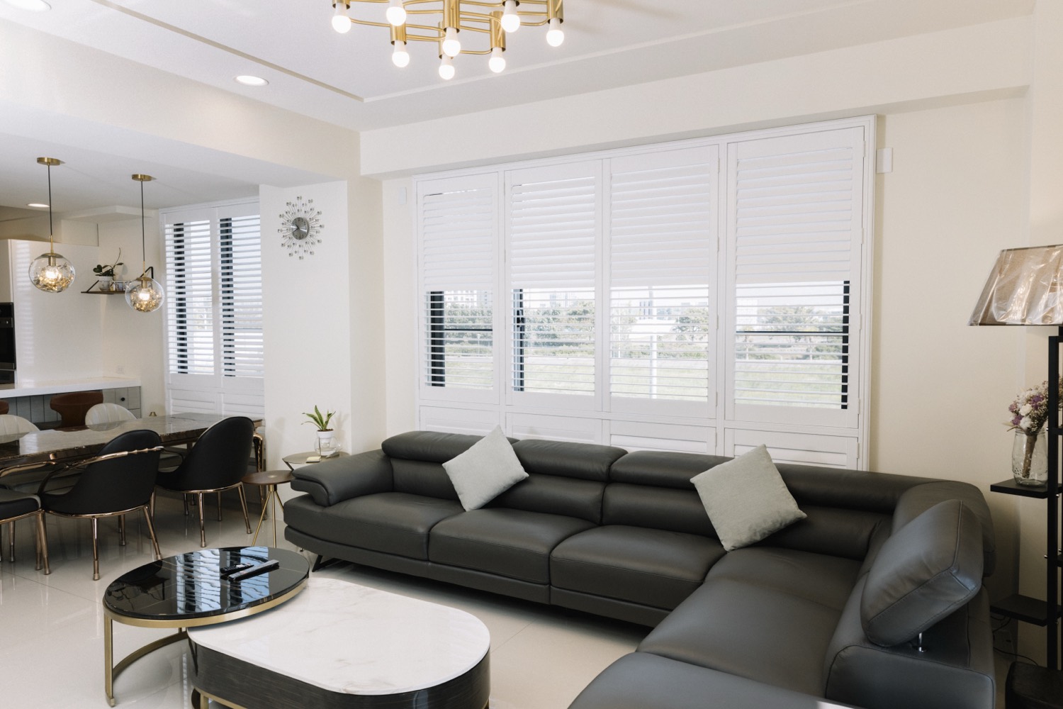 White plantation shutters in a bright living room
